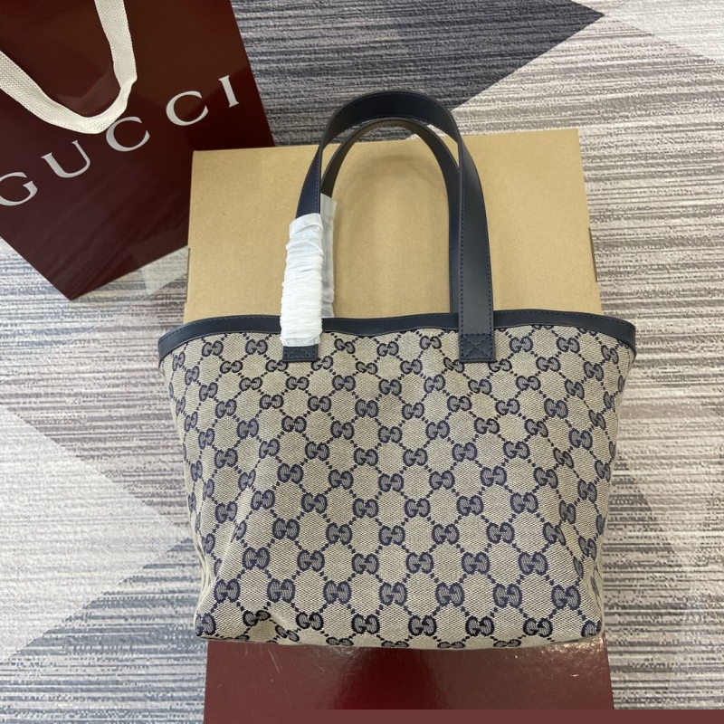 G*u*i shopping bags